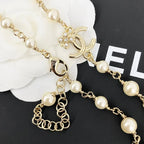 Classic Pearl Necklace with Metal Accents