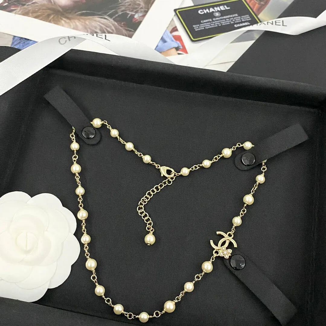 Classic Pearl Necklace with Metal Accents
