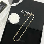 Classic Pearl Necklace with Metal Accents