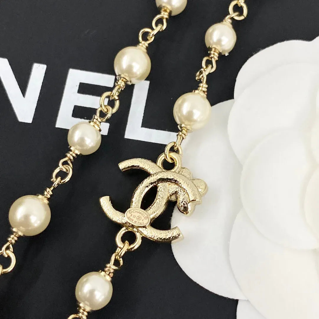 Classic Pearl Necklace with Metal Accents