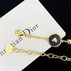 Navy Medallion & Pearl Multi-Charm Bracelet