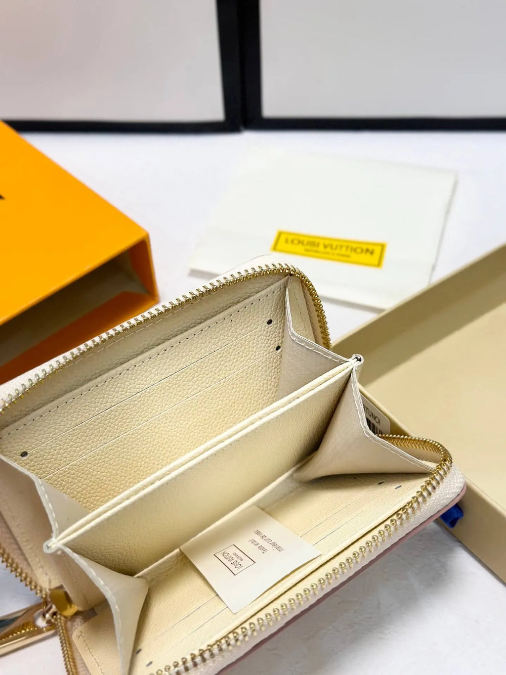 Cream Embossed Zip-Around Long Wallet